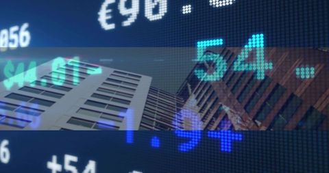 Skyscraper Pair Framing Through Semi-Transparent Digital Stock Ticker Band