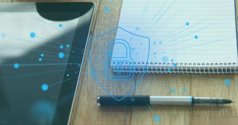Digital workspace securing data with tablet, notebook and pen showing cyber lock overlay
