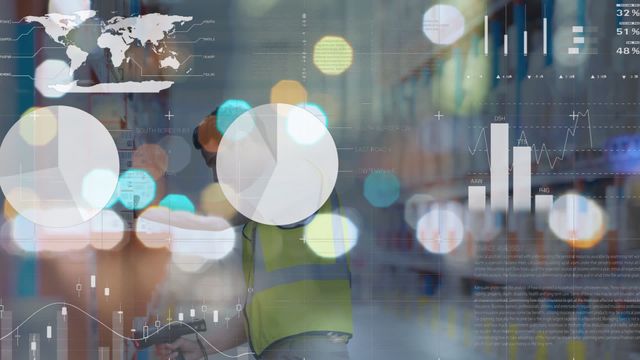 The video depicts a male warehouse worker in a high-visibility vest, surrounded by digital graphs, charts, and a world map. The analysis data overlay represents a blend of manual labor with advanced technological tools, emphasizing the modern impact of data analytics in logistics and distribution settings. Ideal for use in materials highlighting the integration of technology in warehousing, inventory management, logistics solutions, data-driven decision making, and global business strategy discussions.