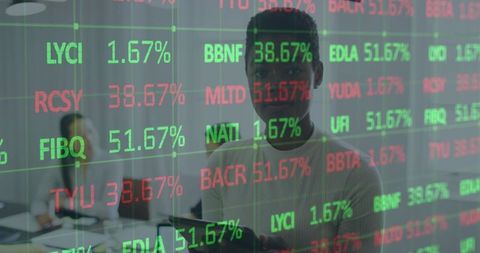 Business Professionals Against Stock Market Projections in Office