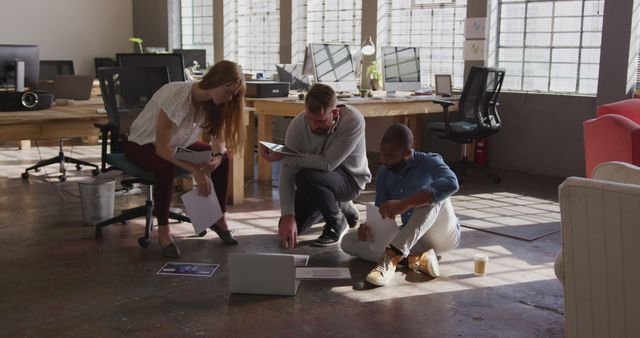 Team Collaborating on Floor in Modern Office - Download Free Stock Images Pikwizard.com