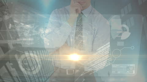 Businessman Engaged in Data and Technology Interfacing