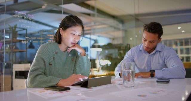 Mixed Team Collaborating on Tablet in Modern Office - Download Free Stock Images Pikwizard.com