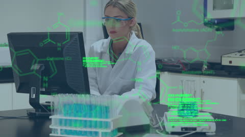 Scientist Analyzing Complex Data on Laboratory Computer