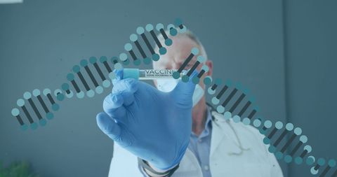 Doctor wearing face mask and gloves focuses on COVID-19 vaccine vial while digital DNA strands overlay implies genetic research links. Ideal for projects on scientific advancements in virology, healthcare articles on vaccine technology, and educational editorial on pandemic responses.