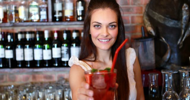 Bartender Serving Cocktail with Smile in Rustic Bar - Download Free Stock Images Pikwizard.com