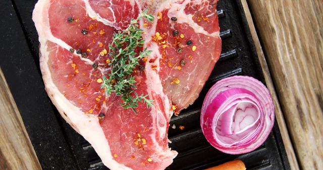 Raw Steak Seasoned with Herbs and Spices on Grill - Download Free Stock Images Pikwizard.com