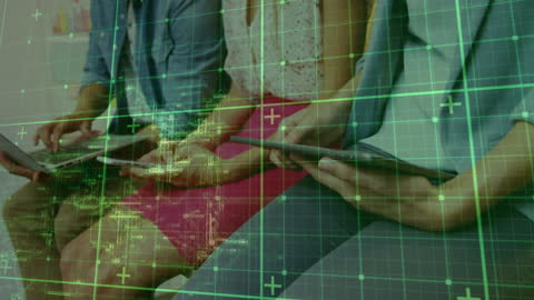 People Using Digital Devices Overlaid With Data Graphics