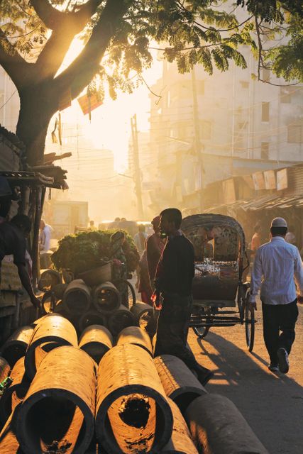 Golden Hour in Bustling Street Market with Bicycle Rickshaw and Market Vendors - Download Free Stock Photos Pikwizard.com