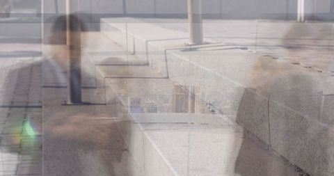 Businessman walking on steps holding smartphone and briefcase, double exposure commute