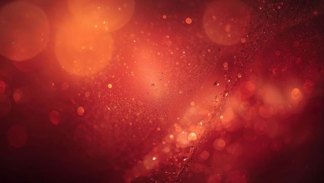 Glittering Red Macro Wet Glass with Bokeh Droplets, Condensation Streaks and Warm Glow