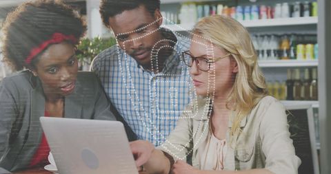 Diverse Team Collaborating on Cybersecurity Solutions at Desk