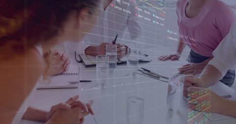 Business Team Analyzing Financial Data with Virtual Hologram Overlay