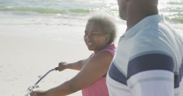 Happy Senior African American Couple Enjoying Beach Bicycle Ride - Download Free Stock Images Pikwizard.com