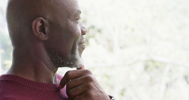 Contemplative African American Man Looking Out Window - Download Free Stock Images Pikwizard.com