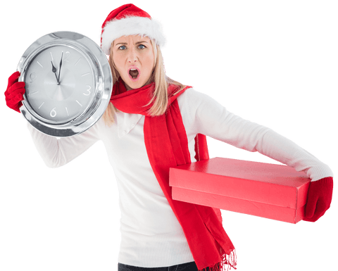 Festive young woman holding clock and christmas gift transparent background