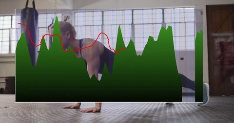 Woman performing push-ups with performance overlay in gym