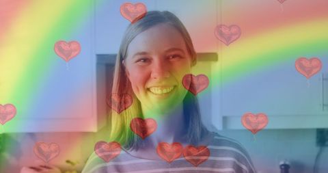 Smiling Woman with Rainbow Hearts Celebrating LGBTQ Pride