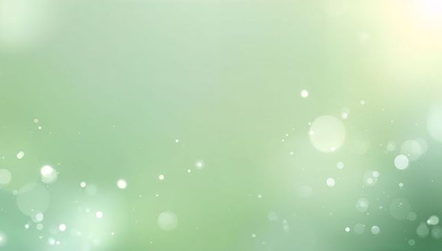 Glowing mint bokeh background with floating light orbs and gentle green gradient