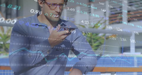 Businessman Analyzing Stock Market Data Over Smartphone