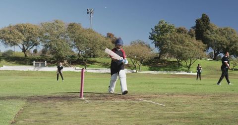 Female Cricket Player Ready to Bat in Match Day Action