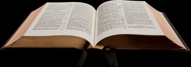 Open Bible with Black Background Highlighting Text - Download Free Stock Photos Pikwizard.com