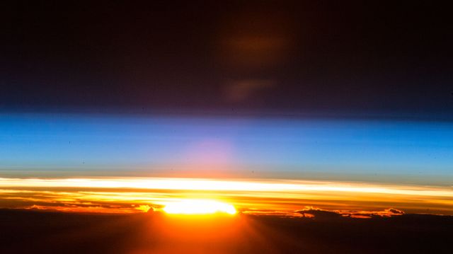 iss054e005627 (Dec. 25, 2017) --- A Christmas Day sunrise is photographed from the International Space Station as the four astronauts and two cosmonauts of Expedition 54 orbited above the Pacific Ocean.