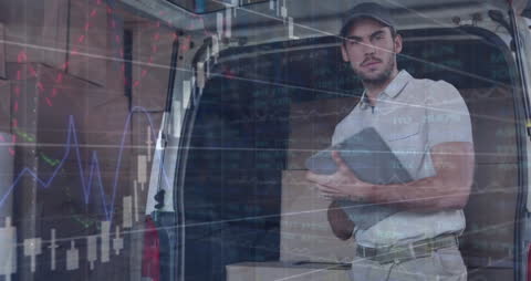 Logistics Professional Analyzing Data in Warehouse Environment