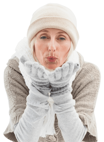 elderly woman in winter attire blowing kiss on transparent background - Download Free Stock Videos Pikwizard.com