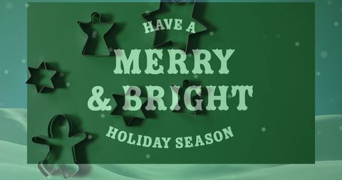 Festive Holiday Greeting with Cookie Cutters on Green Background