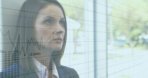 Businesswoman Analyzing Layered Financial Charts on Glass for Corporate Strategy Insight