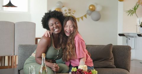 Happy couple celebrating birthday with laughter and joy