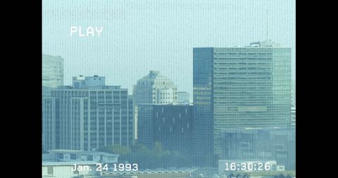 Vintage VHS Overlay on Modern Urban Skyline