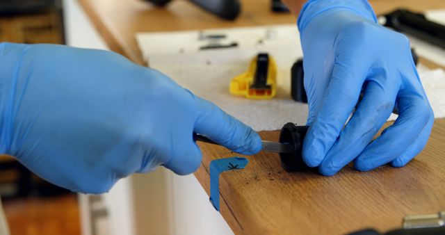 Technician Repairing Electronic Device with Precision Tools - Download Free Stock Images Pikwizard.com