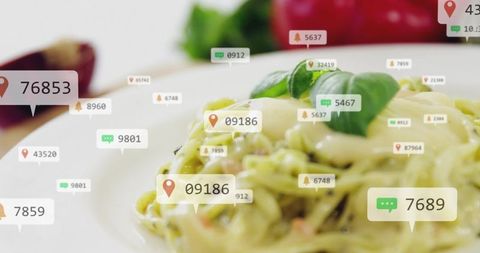 Creamy basil pesto pasta featuring social media notification overlays for food marketing