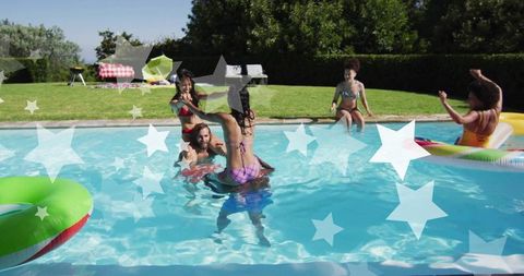 Friends enjoying summer fun in swimming pool