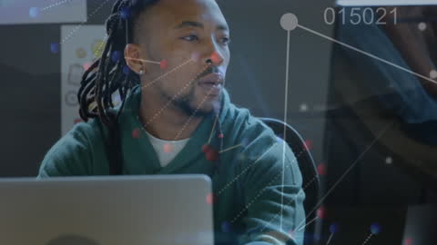 Businessman Analyzing Data Through Futuristic Interface