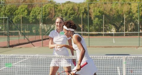 Sportsmanlike Tennis Players Shaking Hands on Outdoor Court