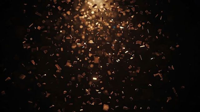 Copper fragments floating in dark background with illuminating glow
