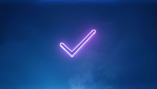 Neon Purple Check Mark Glowing in Digital Sky Backdrop