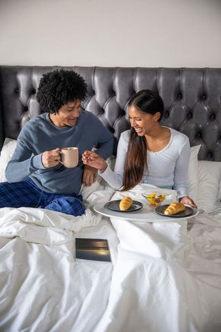 Romantic Morning with Breakfast in Bed Shared by Couple