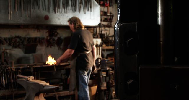 Blacksmith Working at Forge in Workshop - Download Free Stock Images Pikwizard.com