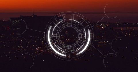Futuristic Digital HUD Over City Skyline at Dusk