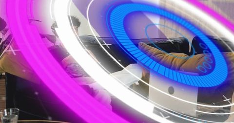 Two men reclining on sofa with holographic AR overlays in casual home lounge