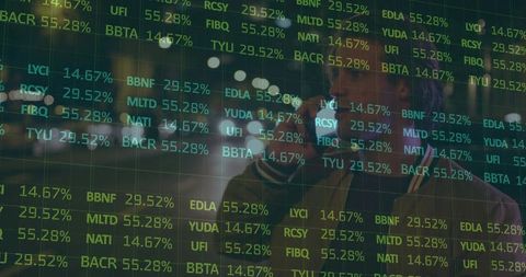 Businessman analyzing digital stock trends in urban setting