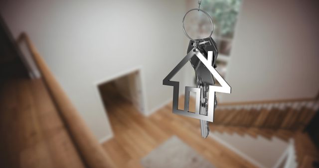 Silver House Key with Keychain in Modern Home Interior - Download Free Stock Images Pikwizard.com