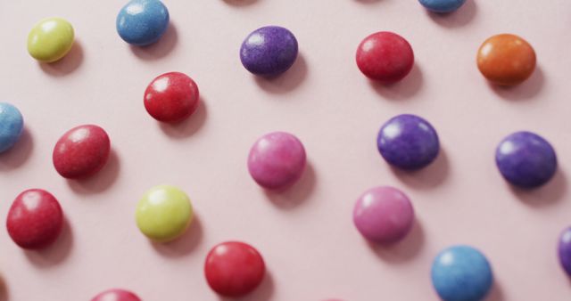 Colorful Candy Buttons on Pink Background - Download Free Stock Images Pikwizard.com