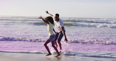 Digital Light Trails Overjoyed Couple on Beach Holiday