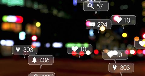 Social Media Notifications over Urban Cityscape at Night