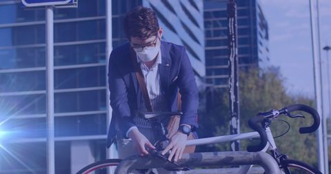 Business Professional Wearing Face Mask Locking Bicycle Outdoors - Download Free Stock Images Pikwizard.com